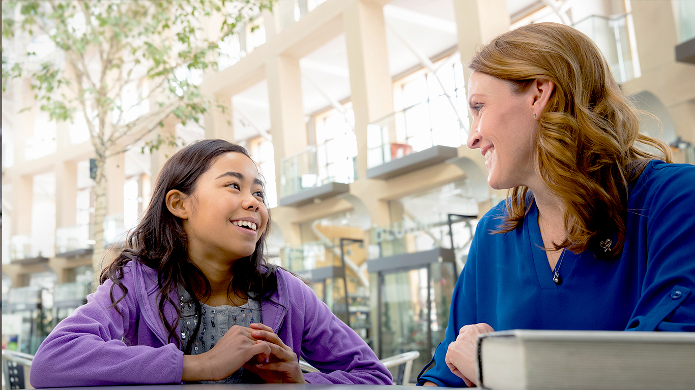 GAL woman and child outside smiling