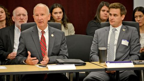 Chief Justice Newby and Ryan Boyce speak at the Behavioral Health Roundtable