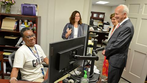 Chief Justice Paul Newby, and his wife Macon Newby (right), greet Judicial Branch employees during eCourts roll-out.